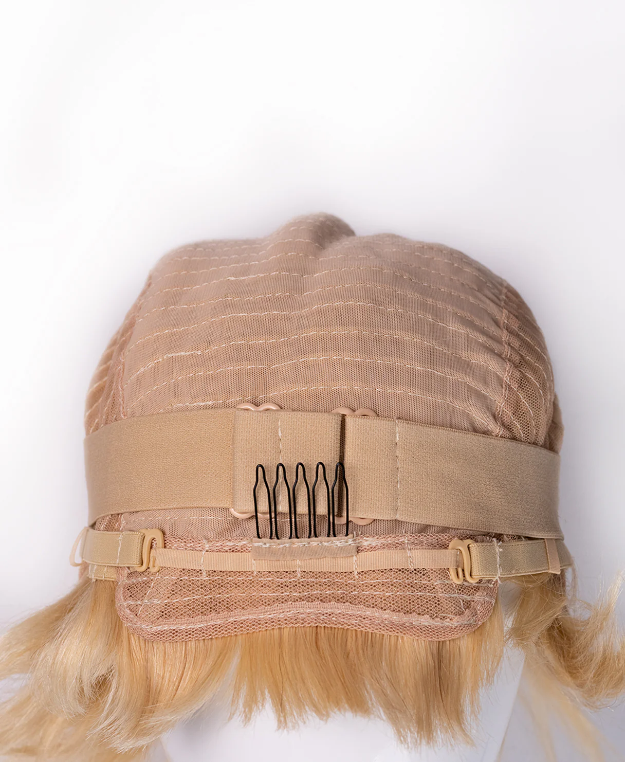 asymmetric wedge human wig - 6" light blonde. - Image 9