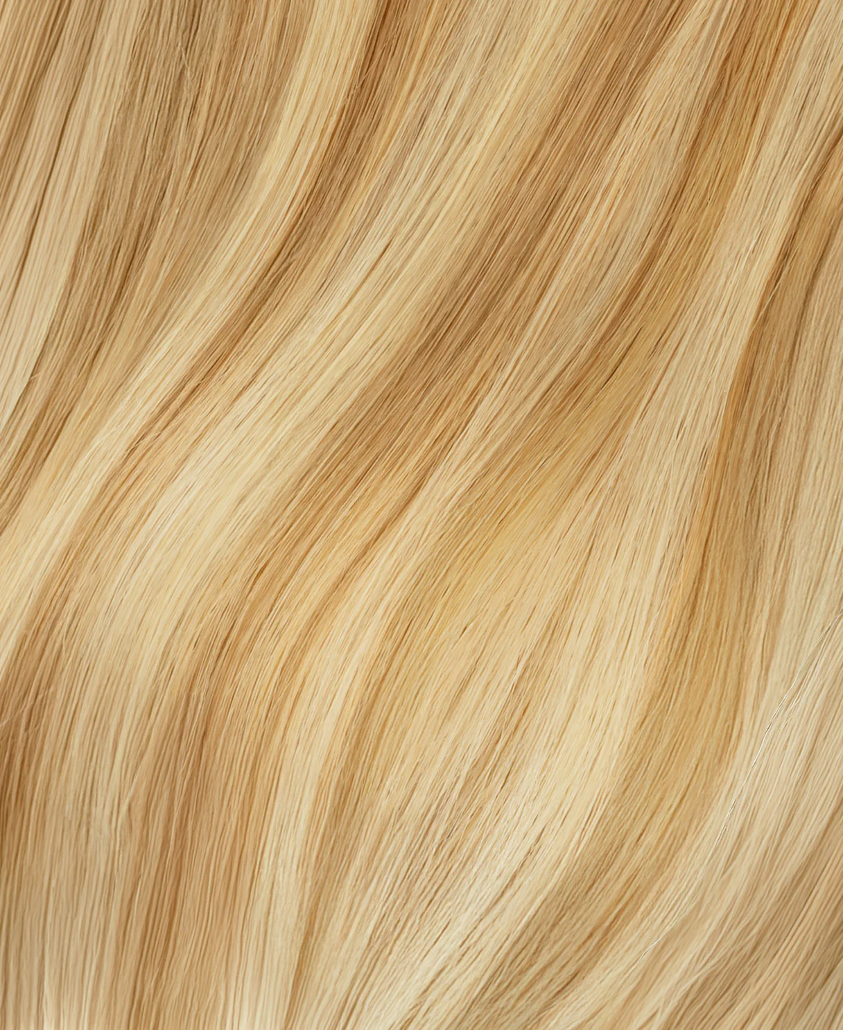 invisible clip-in hair extensions golden highlights. - Image 2