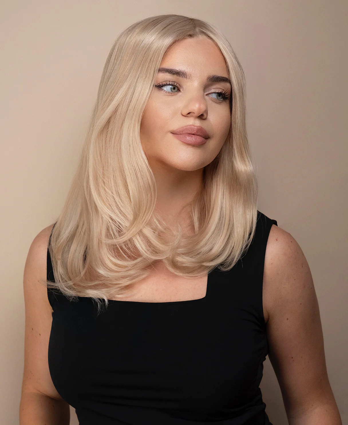 lace front mono wig - 13" platinum blonde.