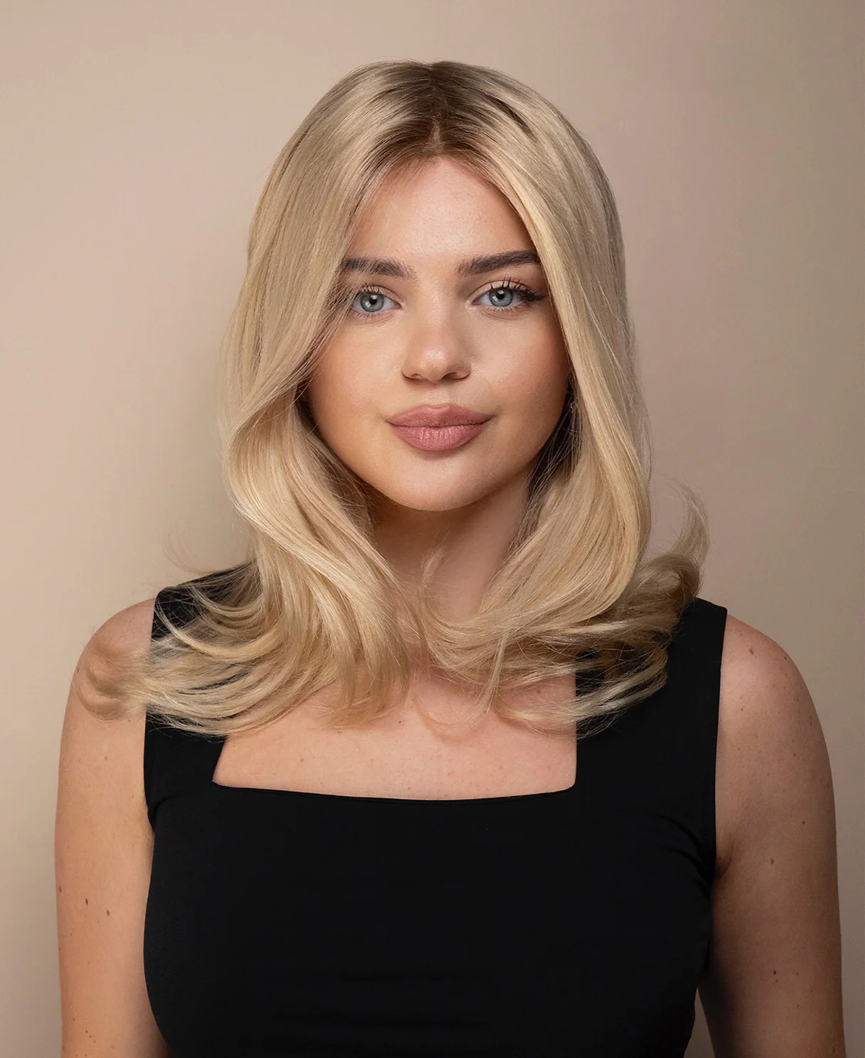 lace front mono wig - 14" shadow root champagne blonde.